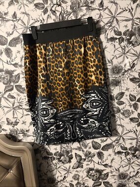 Express Leopard Print Mini Skirt with Black Graphic Hem